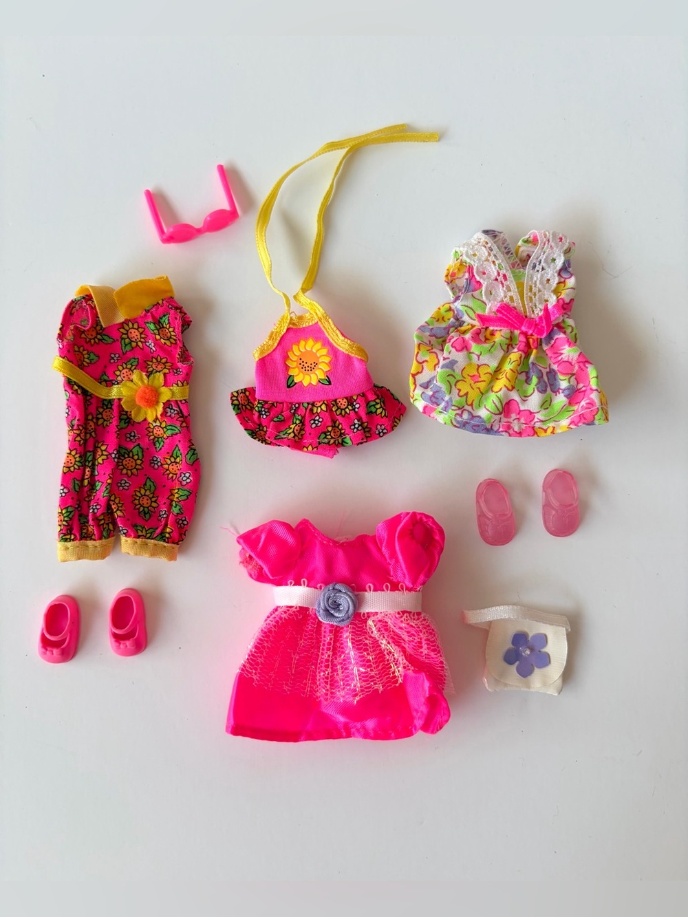 Lot of Barbie Kelly doll clothes